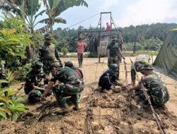 Satgas Gulbencal Kodam l/BB Laksanakan Pengerjaan Jembatan Gantung Garuda di Desa Bandar Kuala-Galang