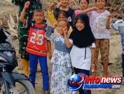 Bentuk Kepedulian Kepada warga Prejurit Yonif TP 854/DK Hibur Dan Bantu Anak-Anak Korban Bencana Di Reje Payung