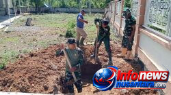 Terik Matahari Tak Surutkan Semangat Satgas TMMD 129 Kodim 0102/Pidie Gali Septic Tank untuk Bangun MCK di TPU Blang Cot